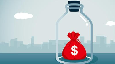 money in glass jar