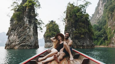 Couple on boat in Thailand