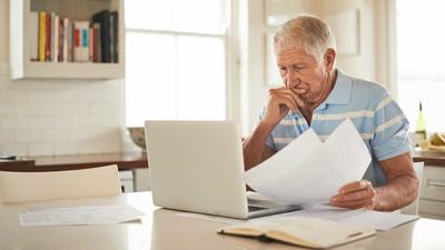 senior man using a laptop