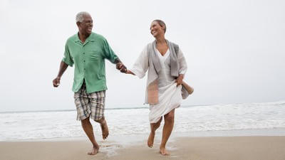senior couple on beach