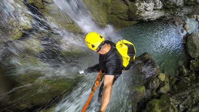 A man canyoning