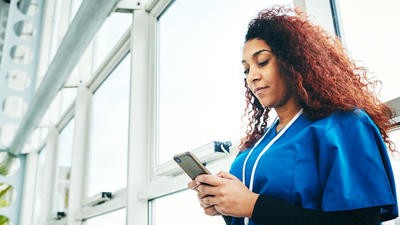 Nurse on mobile phone
