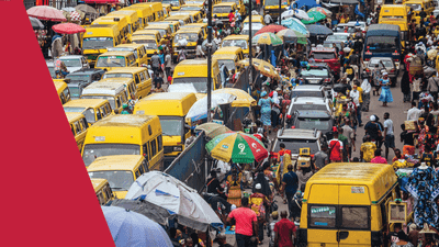 busy street full of cars and people