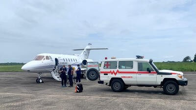 air ambulance plane and truck at airport