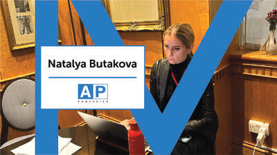 Natalya Butakova from AP Companies working from her laptop