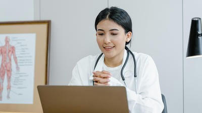 Graphic of doctor using computer