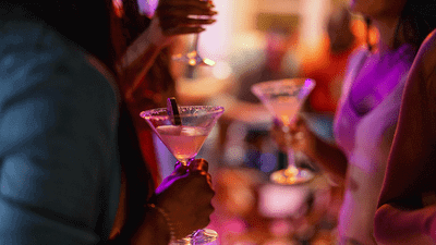 Picture of people drinking cocktails in a bar