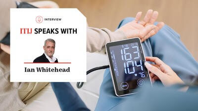 Arm with blood pressure getting taken