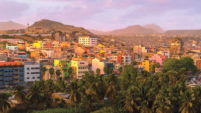 Image of the colourful houses and mountains in the background of Cape Verde