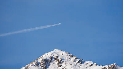 Plane over a mountain