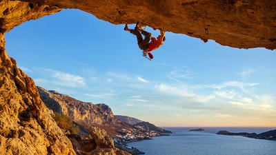 Imagine of a person rock climbing in Greece