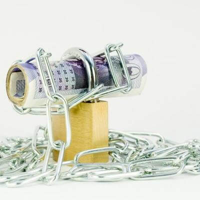 Chains around bank notes