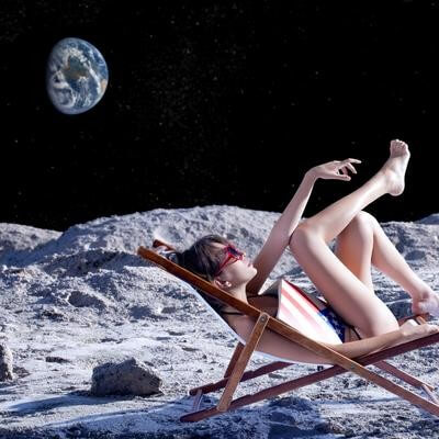 Woman sunbathing in space