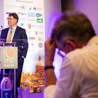 John Armstrong speaking at the insurance premiums pricing session