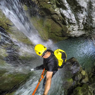 A man canyoning