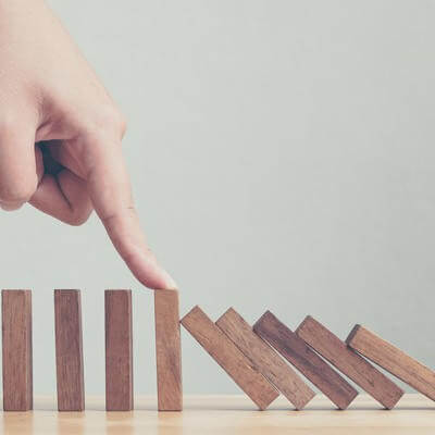 crisis management dominos