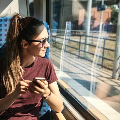 Young woman travelling on train