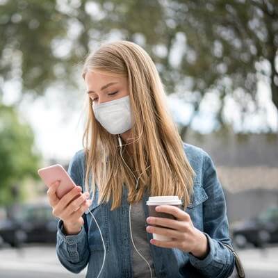 Woman with smartphone in London