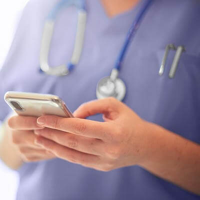 Nurse holding phone