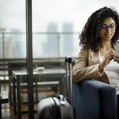 Woman on phone at airport