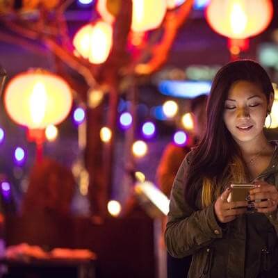 lady uses phone in taiwan