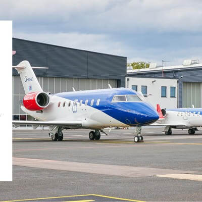 Jérôme Pin and Tom Hienckes headshots with EAA jet