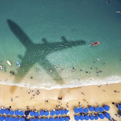 airplane beach GettyImages-621821582