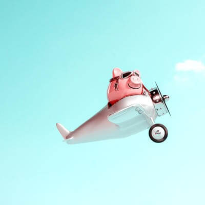 piggy bank plane GettyImages-1403853761