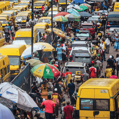 busy street full of cars and people