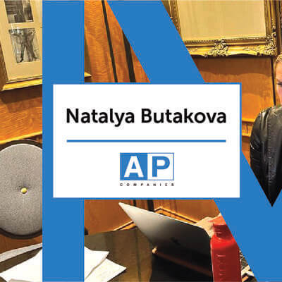 Natalya Butakova from AP Companies working from her laptop