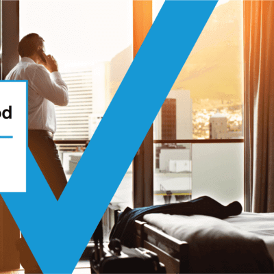 Business man in hotel abroad talking on the phone