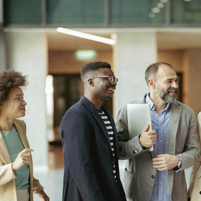 Image of employees smiling together