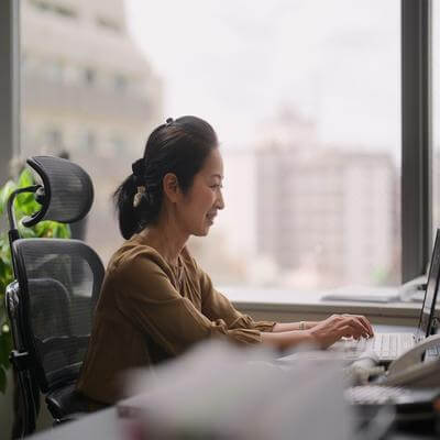 Image of woman happy at work