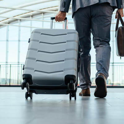 Image of workers embarking on business trip