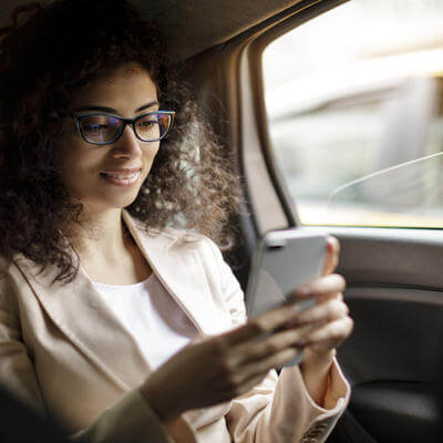 Woman checking app on her phone