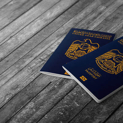 Image of two UAE passports representing UAE travel