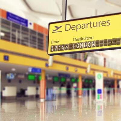Airport departures board going to London