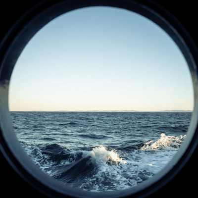 Cruise ship porthole rough stormy seas