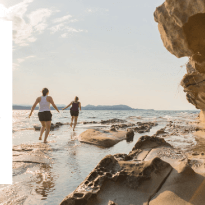 Graphic of people running on the beach