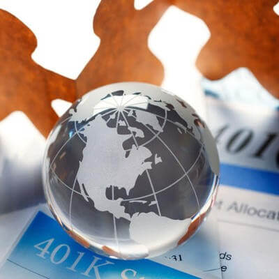 Concept imagery of cut out people and globe