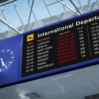 International Departures Information Board with All Flights Cancelled