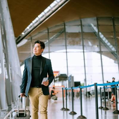 Business traveller in Malaysia airport 