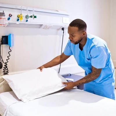 Hospital bed with nurse