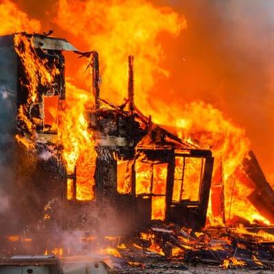 House burning in wildfire