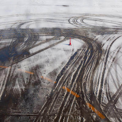 Airplane tire track on snow in runway, winter season