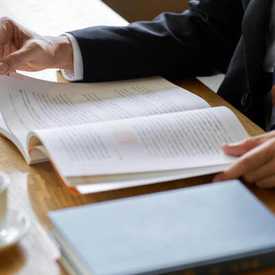 Businessman reading a book 