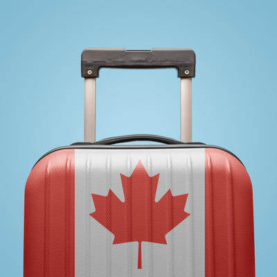Baggage with Canada flag print tourism and vacation concept