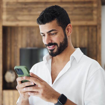 Flyadeal man booking on phone