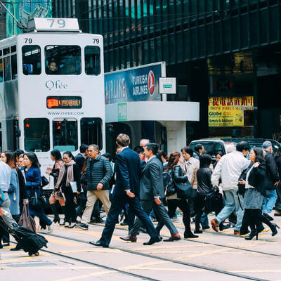 Hong Kong crowd commuter crossing crosswalk rush hour