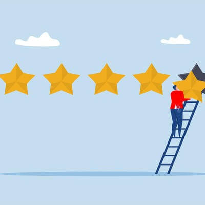 Businessman holding 5th star climb up ladder to put on best rating